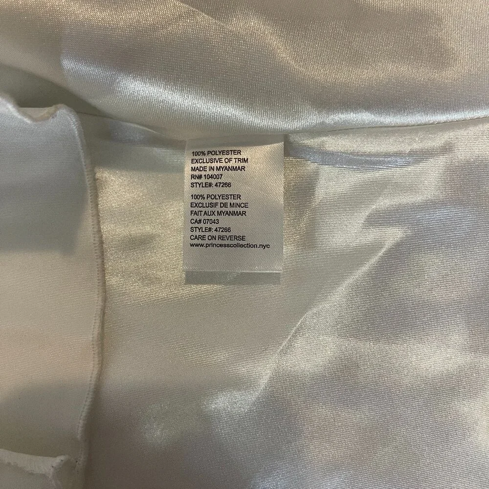 COUTURE PRINCESS. SIZE 6 IN LONG PRINCESS-CUT FLOWERED POLYESTER.
